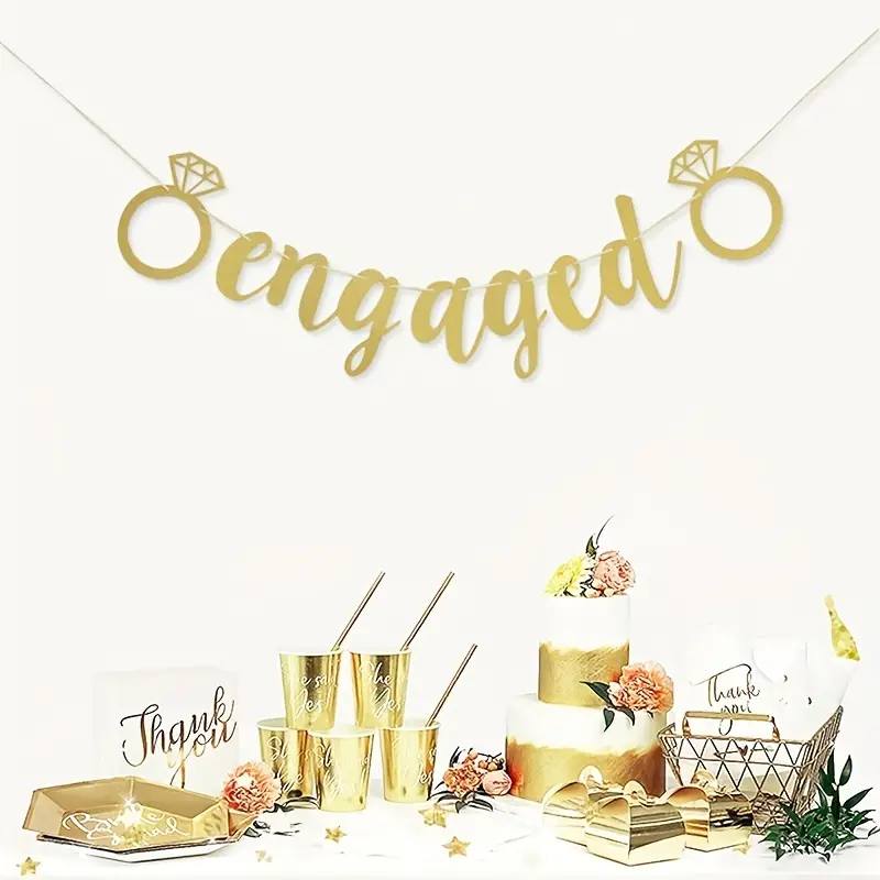 Golden "Engaged" Banner with Diamond Ring Design